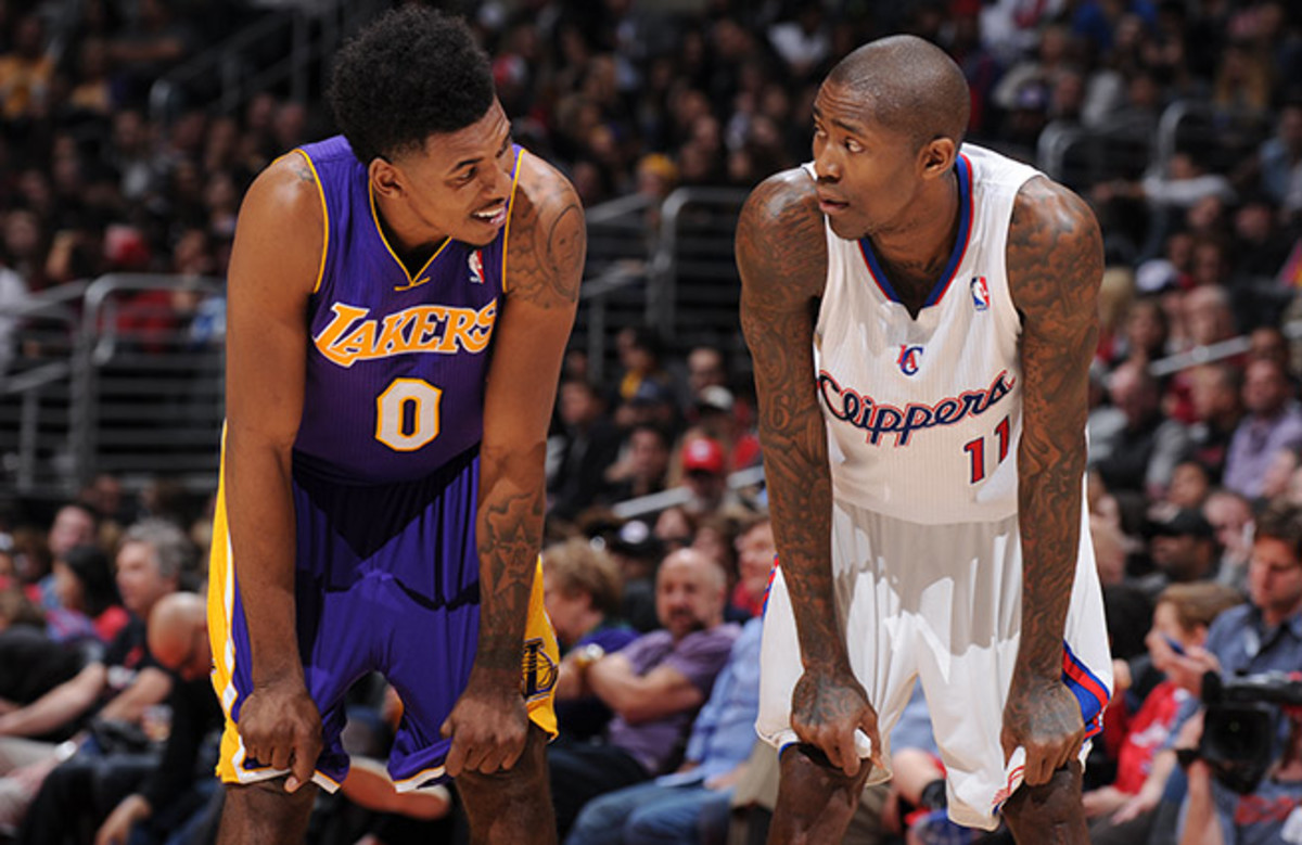 Trading places: The lowly Lakers are stuck in the Western cellar, while the Clips look like contenders.